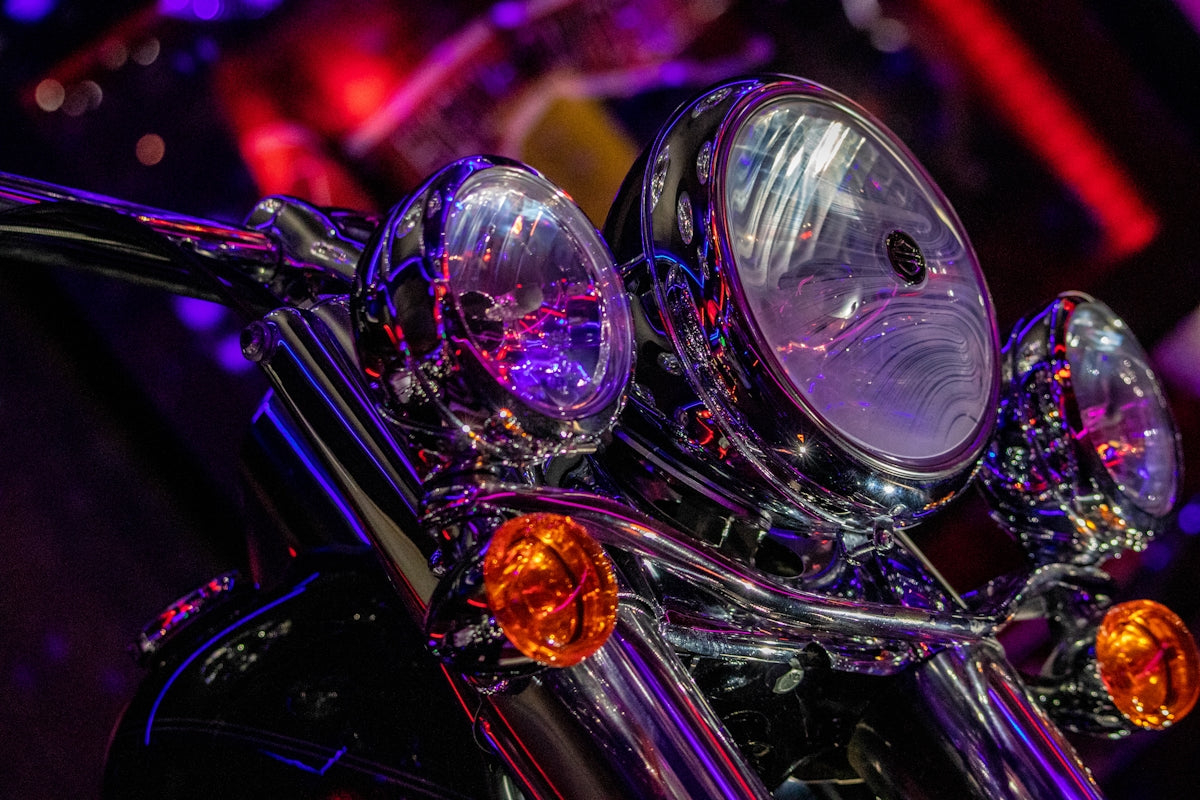 a close up of a motorcycle's headlight
