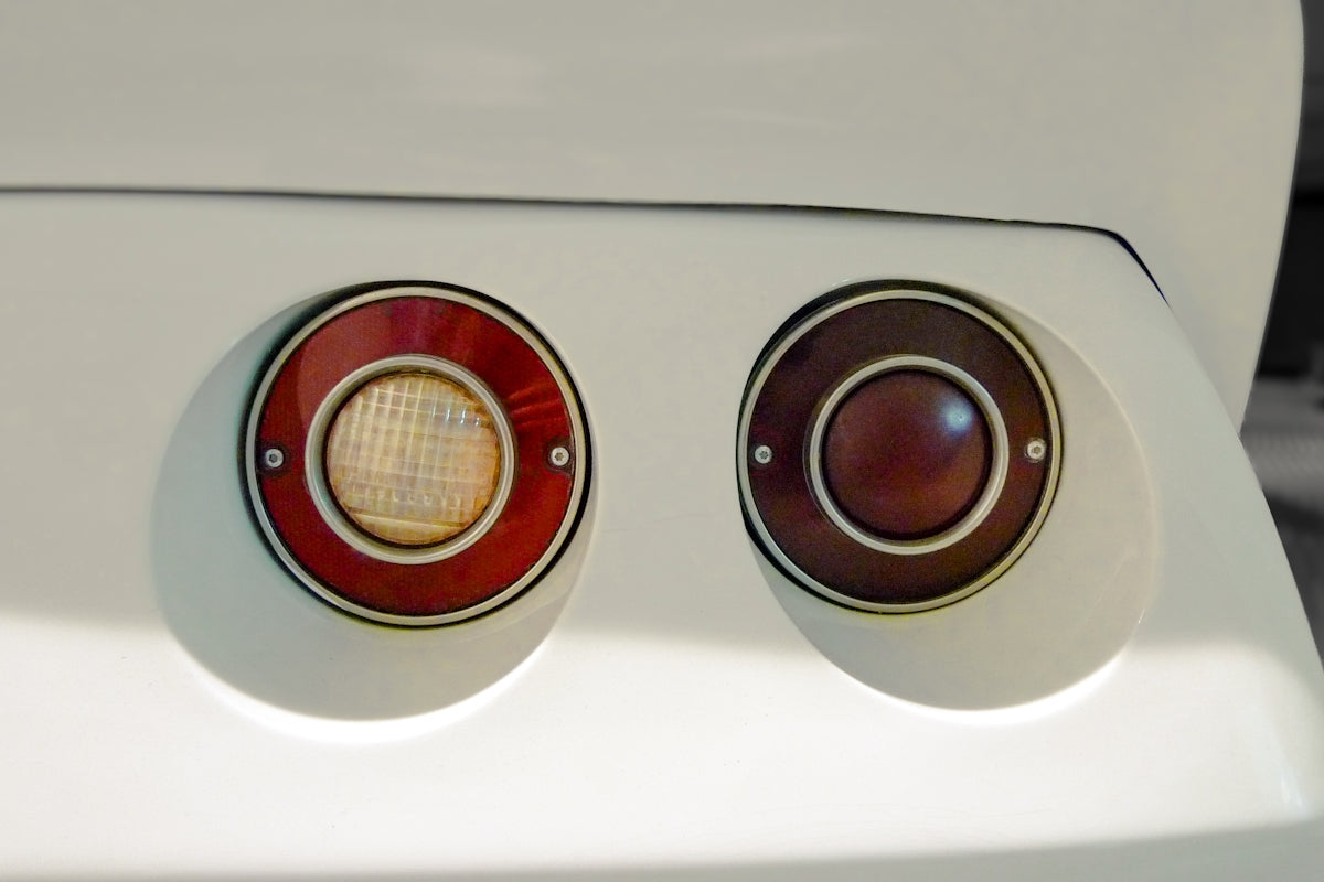 A close up of a car's tail lights