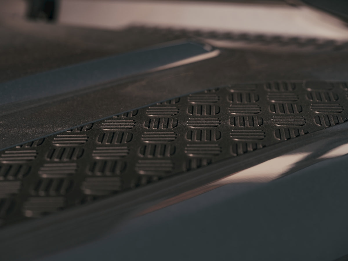 Non-slip surface on a vehicle's step.
