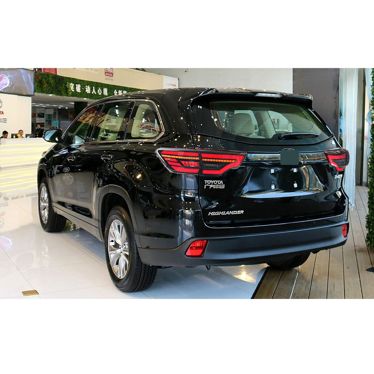 2014-2019 Toyota Highlander with black sequential LED tail lights installed