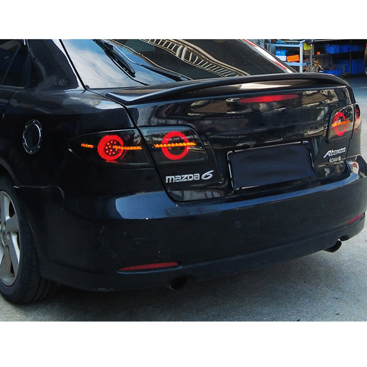 2003-2008 Mazda 6 Sedan with smoked sequential LED tail lights installed