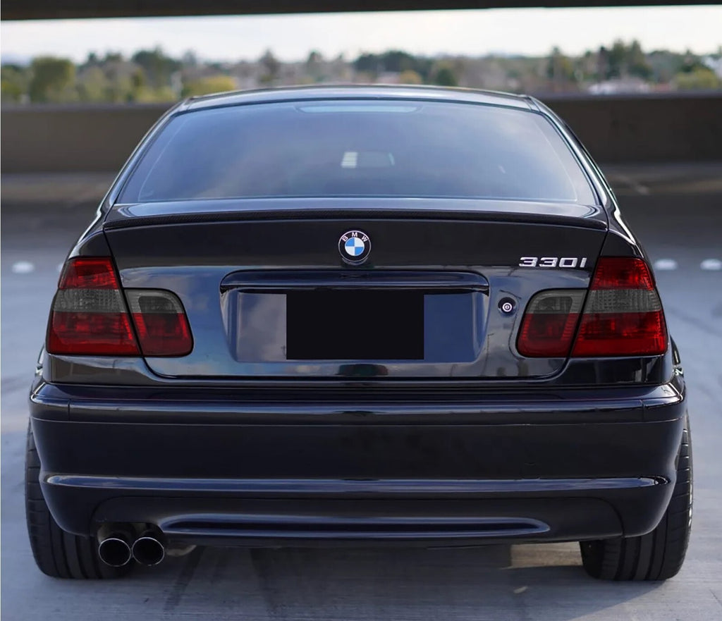Rear view of a BMW E46 330i sedan with Euro red/smoke tail lights installed