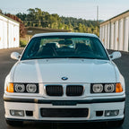 Installed on a white BMW E36 M3