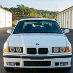 Installed on a white BMW E36 M3