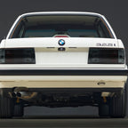 Euro smoke tail lights installed on a white BMW E30 325i