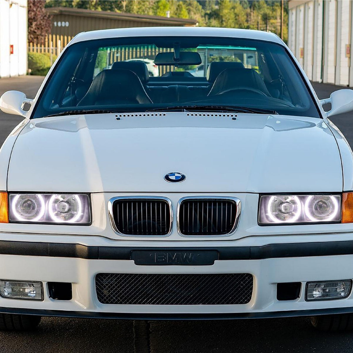 Installed on a white BMW E36 M3
