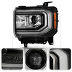 Left HID headlight lens close-up for 2016-2018 GMC Sierra 1500