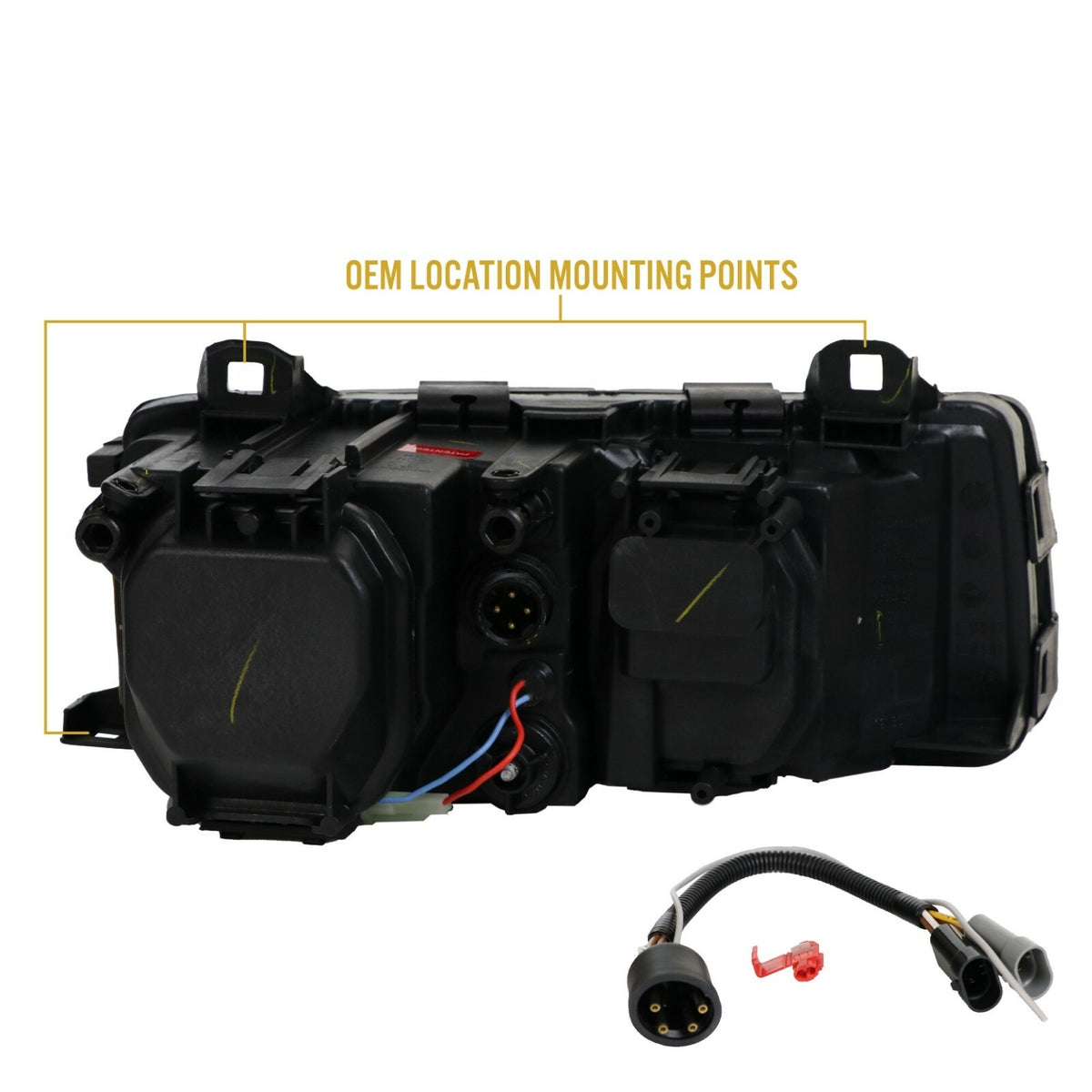 Back of the headlight with mounting points and wiring adapter