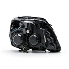 Chrome Halogen Projector headlight lens and housing detail for 2010-2015 GMC Terrain SL SLE SLT