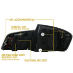 Back of the F10 tail light showing mounting tab and bulb panel
