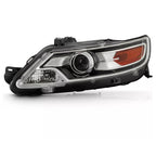 Left halogen projector headlight lens close-up for 2010-2012 Ford Taurus