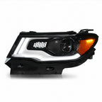 Left HID headlight lens close-up for 2017-2021 Jeep Compass