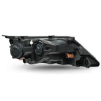 Left halogen headlight lens close-up for 2010-2012 Ford Fusion