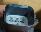 Left halogen headlight lens close-up for 2005-2011 Cadillac STS