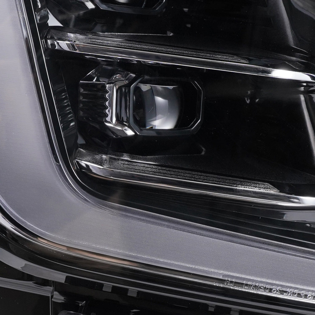 Left LED headlight lens close-up for 2025-2026 GMC Yukon / Yukon XL AT4 / Elevation