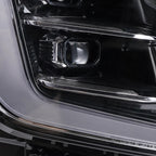 Left LED headlight lens close-up for 2025-2026 GMC Yukon / Yukon XL AT4 / Elevation