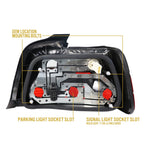 Back of the E36 sedan tail light showing OEM-location mounting bolts and socket slots