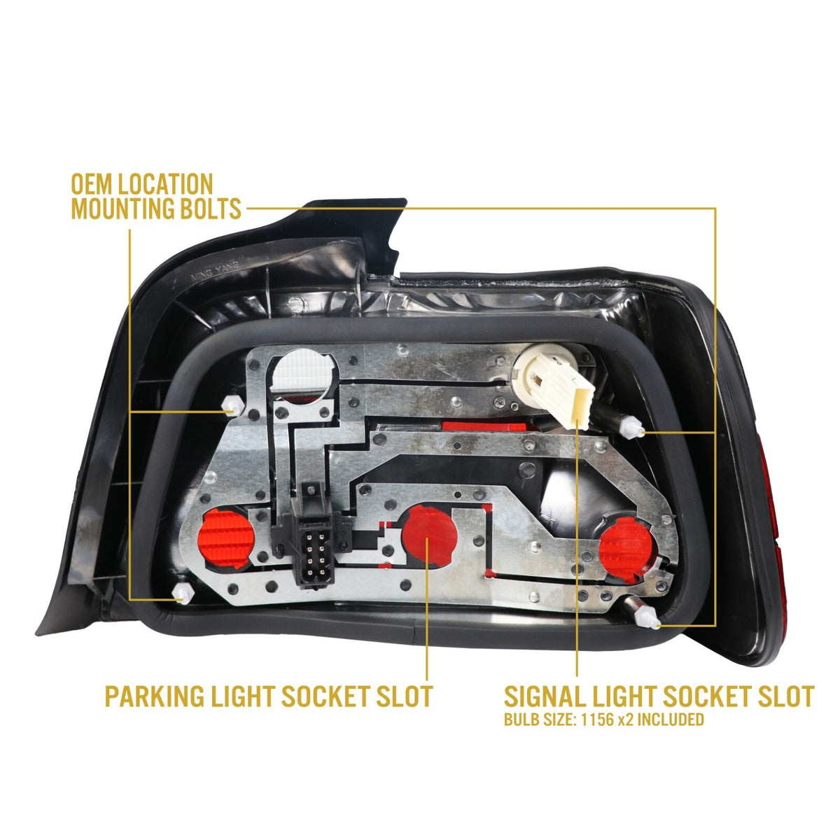 Back of the E36 sedan tail light showing OEM-location mounting bolts and socket slots