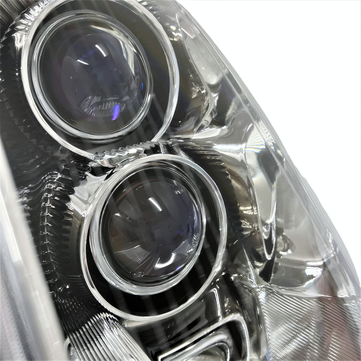 Right halogen headlight lens close-up for 2005-2011 Cadillac STS