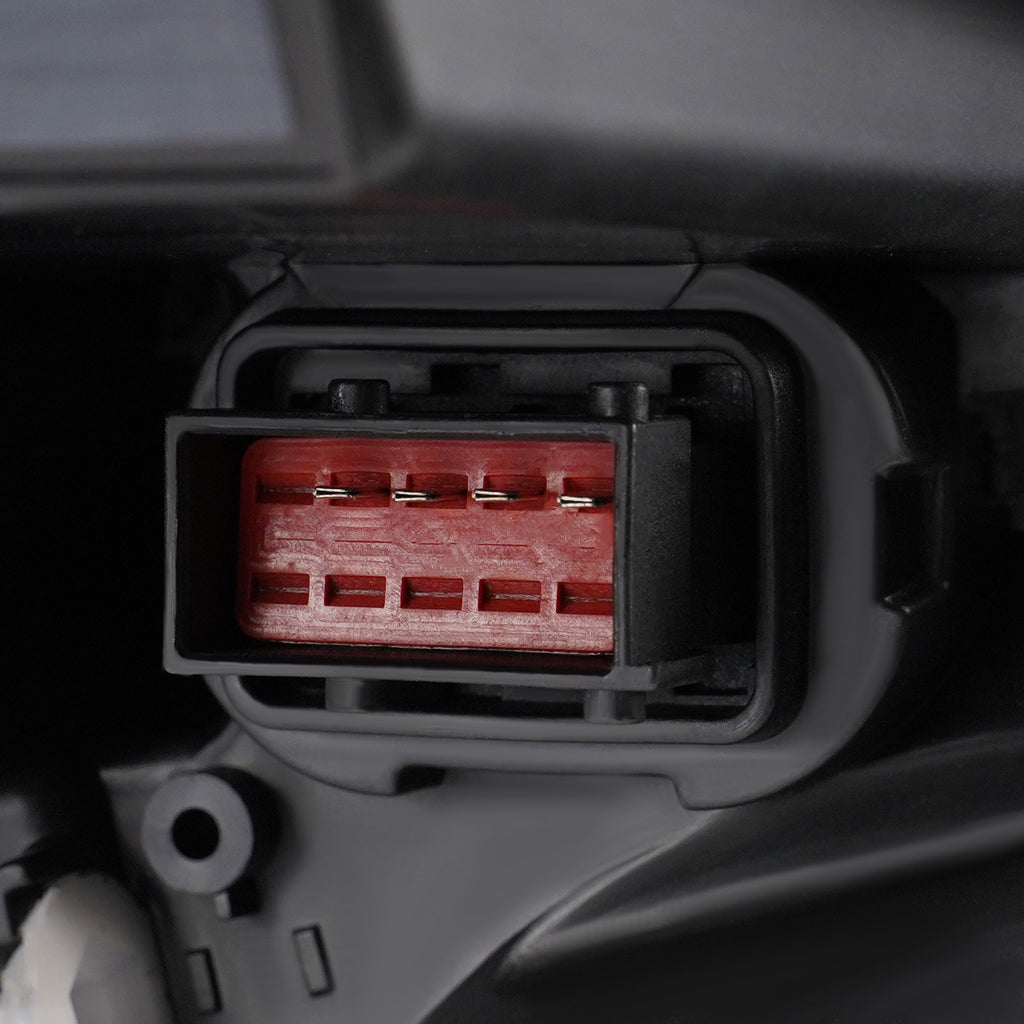Left halogen projector headlight lens close-up for 2014-2019 Cadillac CTS