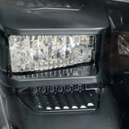 Left LED projector headlight lens close-up for 2018-2021 Ford Expedition