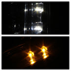 Right halogen projector headlight lens close-up for 2010-2016 Cadillac SRX