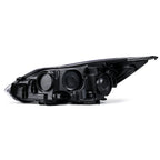 Right halogen projector headlight lens close-up for 2012-2014 Ford Focus