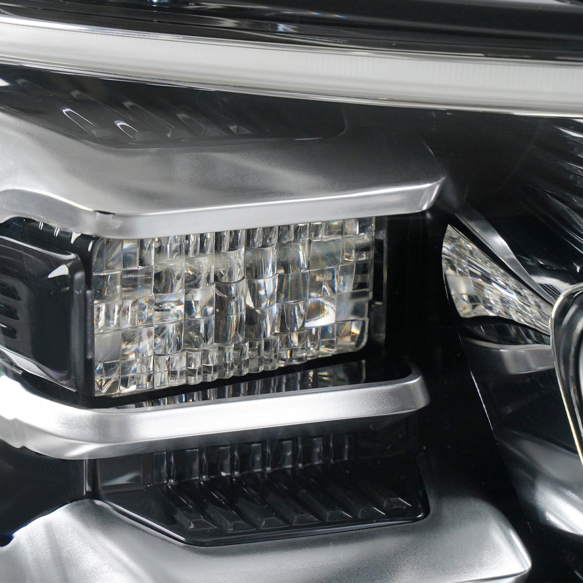Left LED headlight lens close-up for 2018-2021 Ford Expedition