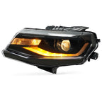 Right halogen projector headlight lens close-up for 2016-2021 Chevy Camaro