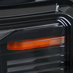 Left LED headlight lens close-up for 2024-2026 GMC Acadia AT4 / Elevation