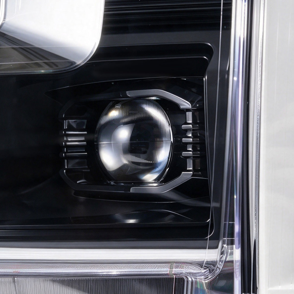 Left LED headlight lens close-up for 2024-2026 Ford F-150 Raptor