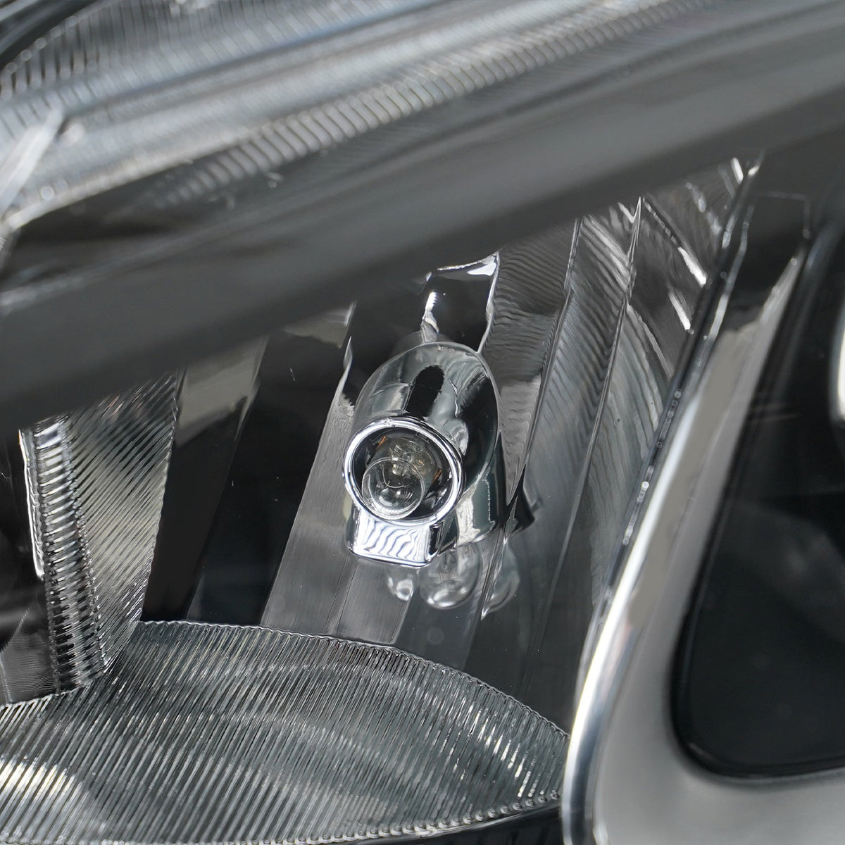 Left halogen headlight lens close-up for 2019-2022 Chevy Spark
