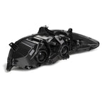 Right halogen projector headlight lens close-up for 2013-2016 Ford Fusion