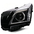 Right halogen projector headlight lens close-up for 2014-2019 Cadillac CTS