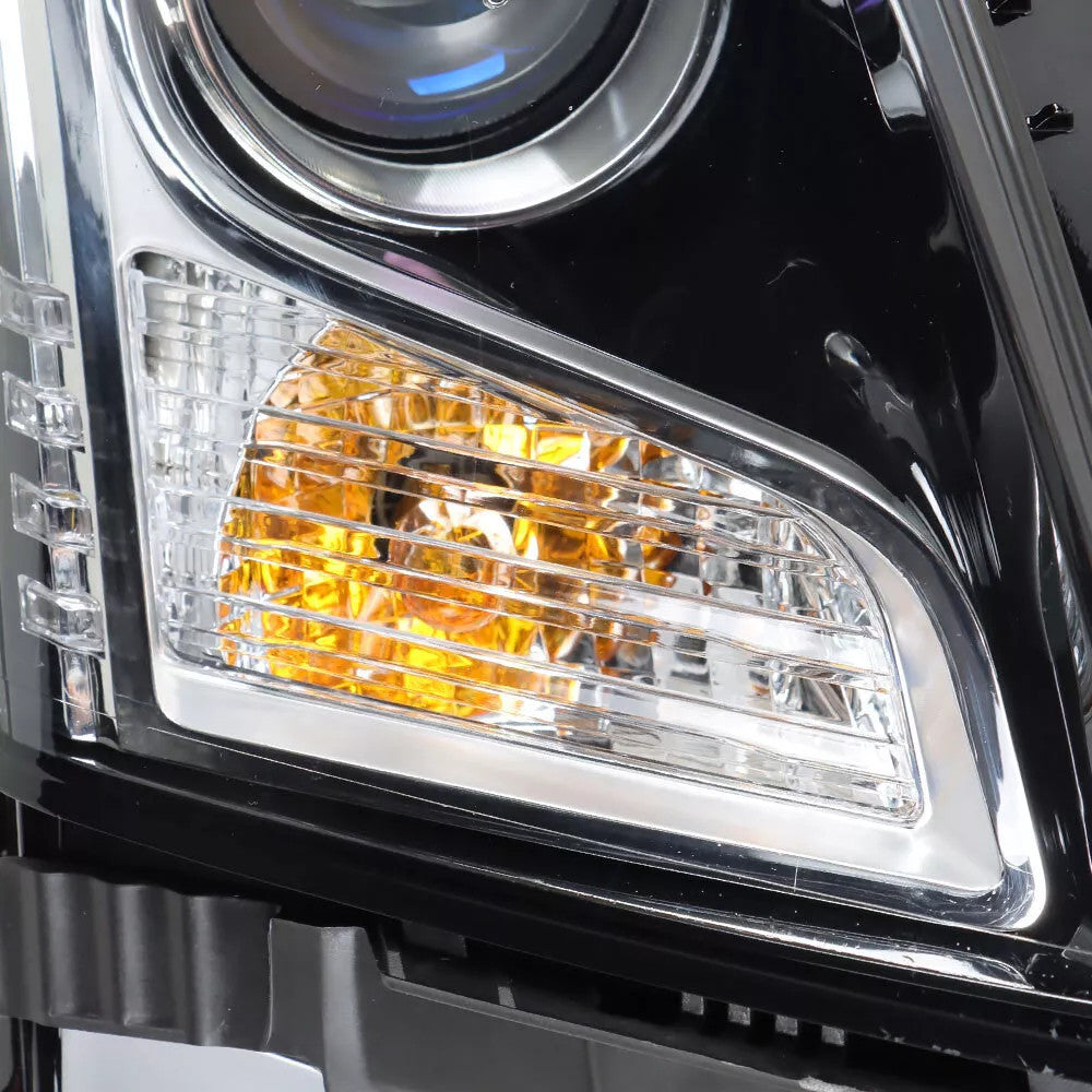 Right halogen projector headlight lens close-up for 2013-2018 Cadillac ATS