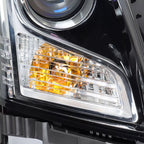 Right halogen projector headlight lens close-up for 2013-2018 Cadillac ATS