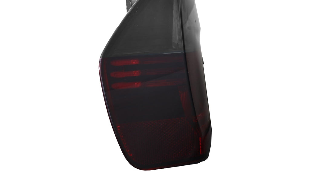 Side profile of the red/smoke E90 sedan tail light