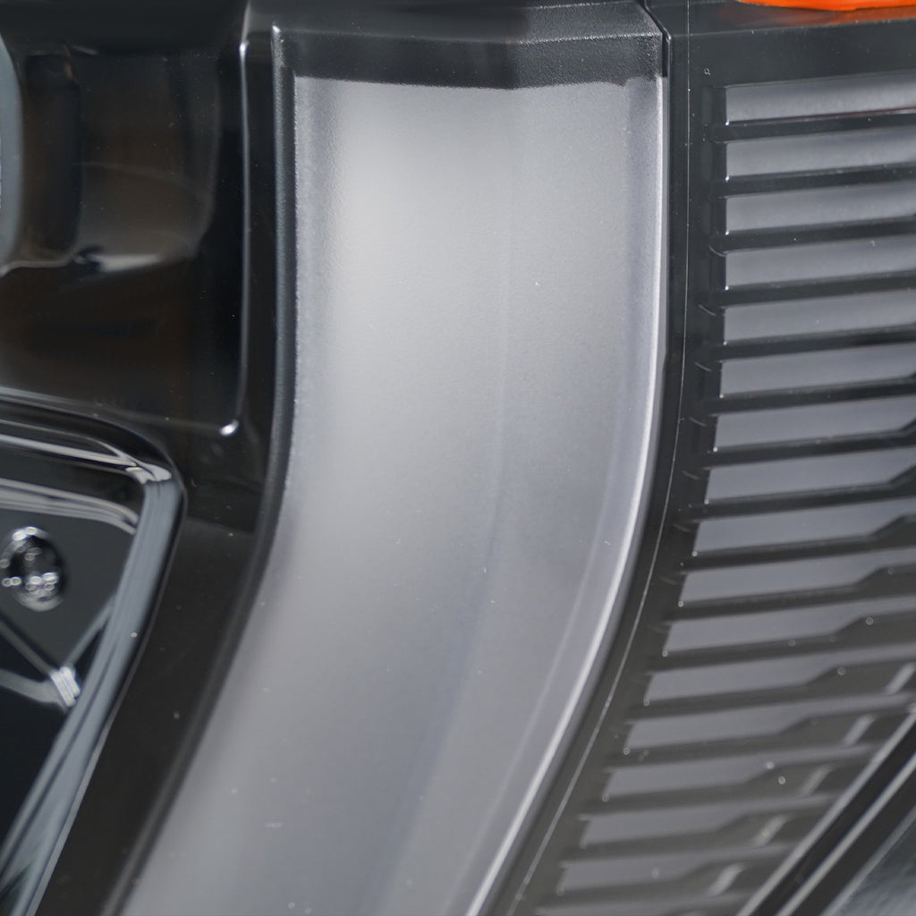 Right LED headlight lens close-up for 2024-2026 GMC Acadia AT4 / Elevation