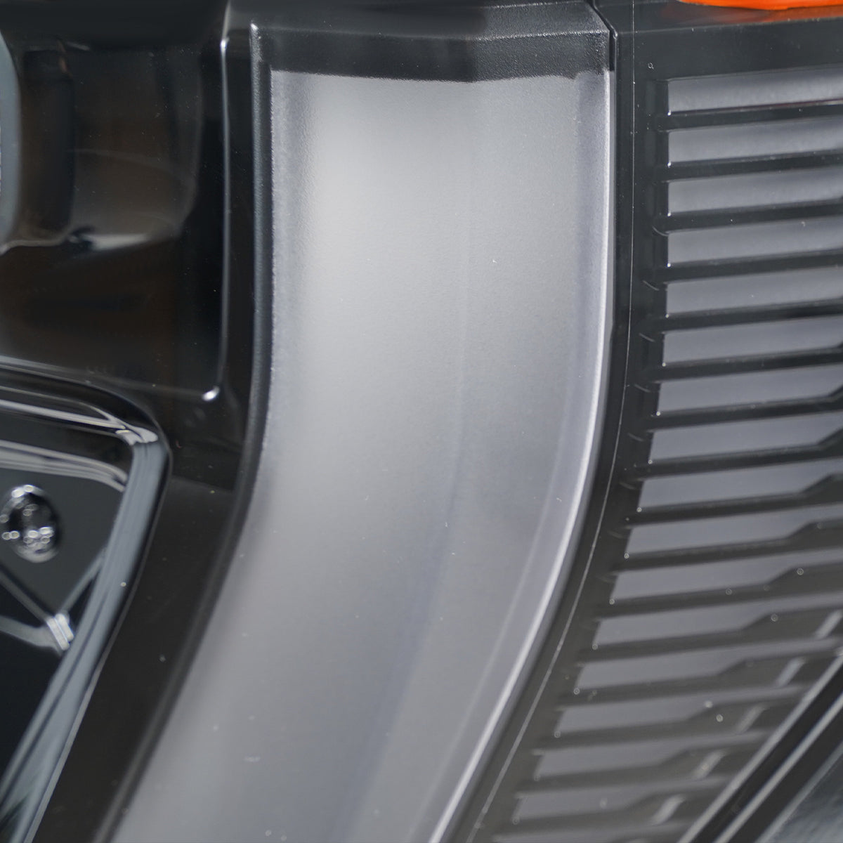 Right LED headlight lens close-up for 2024-2026 GMC Acadia AT4 / Elevation
