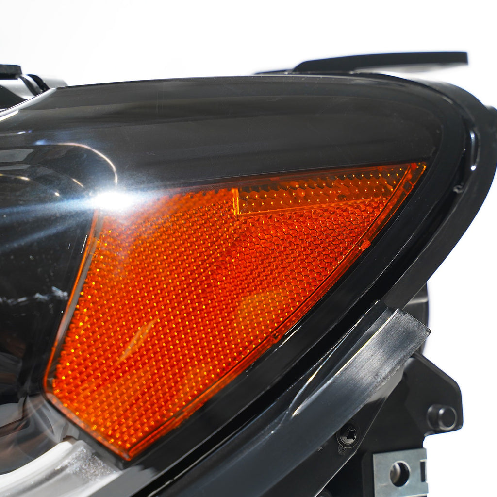 Right halogen projector headlight lens close-up for 2017-2021 Jeep Compass