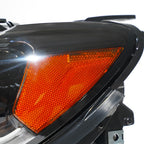 Right halogen projector headlight lens close-up for 2017-2021 Jeep Compass