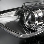 Left HID headlight lens close-up for 2009-2017 Infiniti FX35/FX37/QX70
