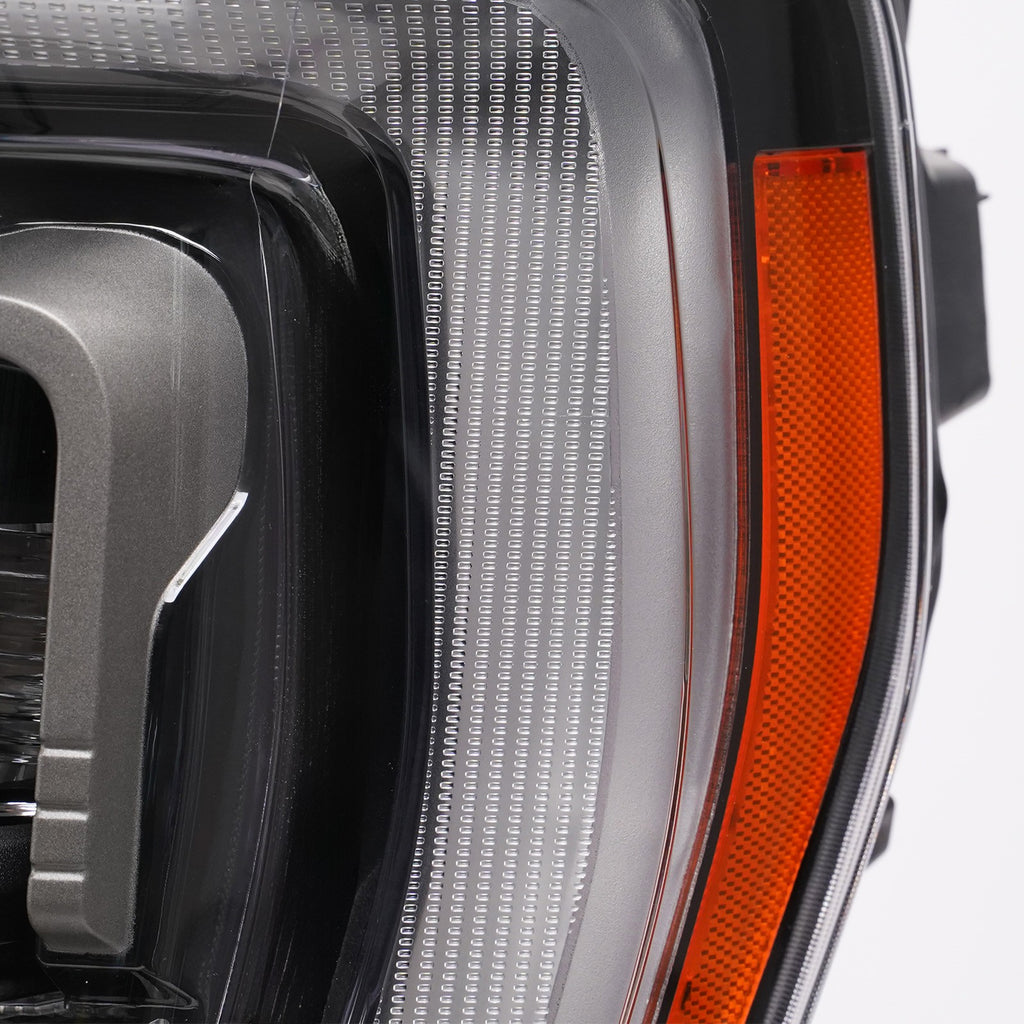 Right LED headlight lens close-up for 2021-2023 Ford F-150 Raptor