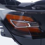 Left halogen projector headlight lens close-up for 2014-2020 Chevy Impala