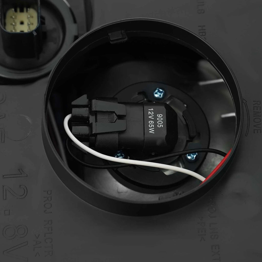 Right HID headlight lens close-up for 2015-2020 GMC Yukon