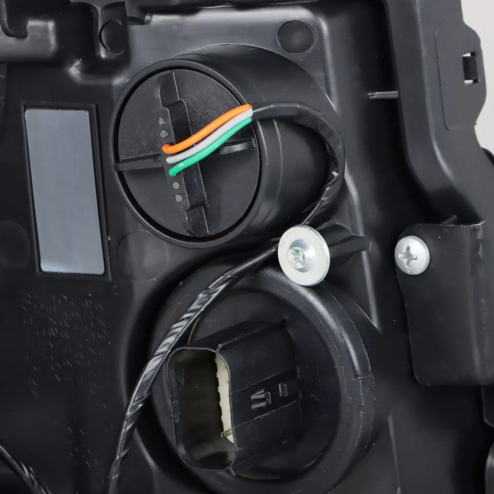 Halogen projector headlight connector close-up for 2013-2018 Cadillac ATS