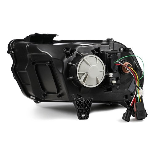 Left projector headlight lens close-up for 2010-2014 Ford Mustang