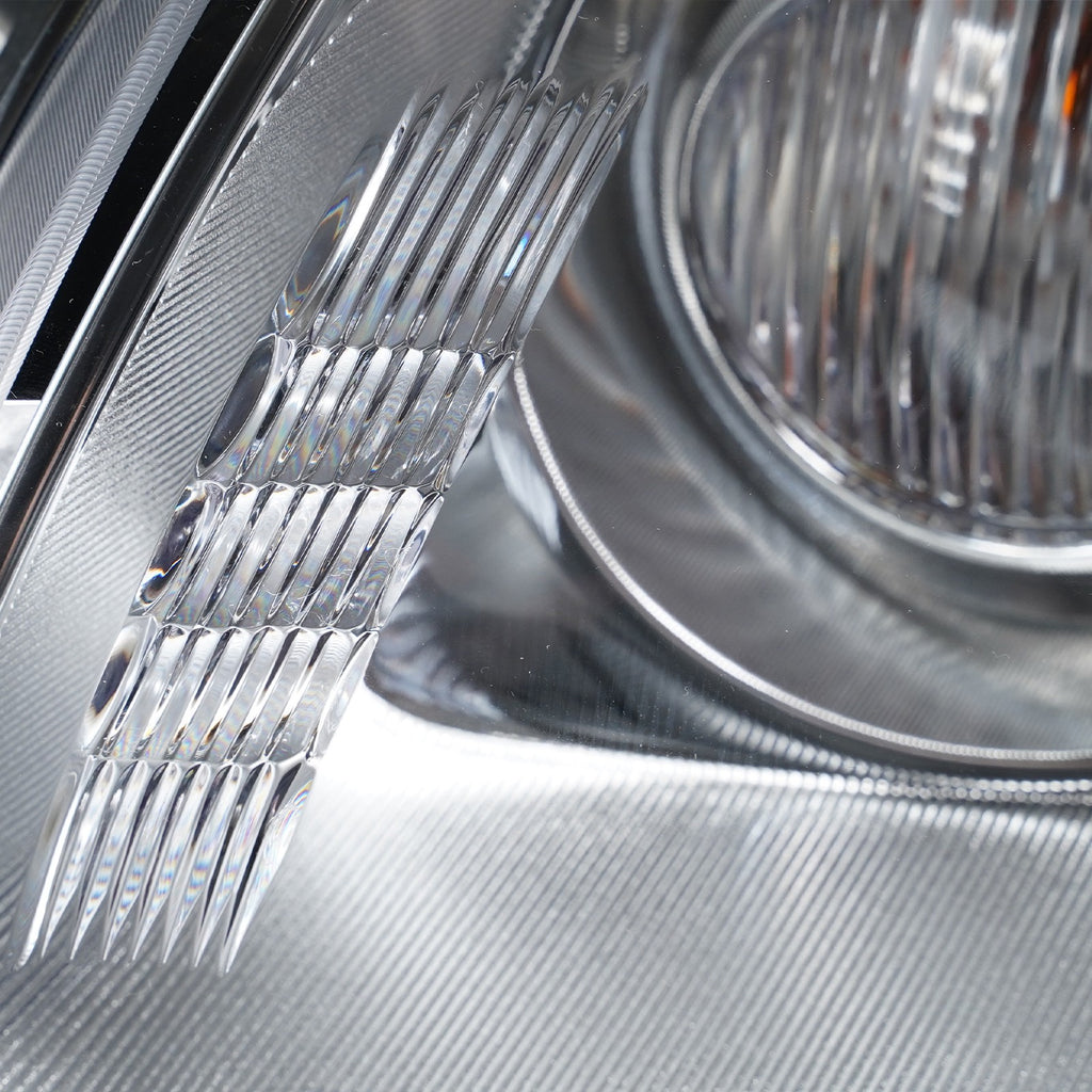 Left HID headlight lens close-up for 2008-2012 Buick Enclave