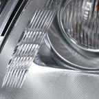 Left HID headlight lens close-up for 2008-2012 Buick Enclave