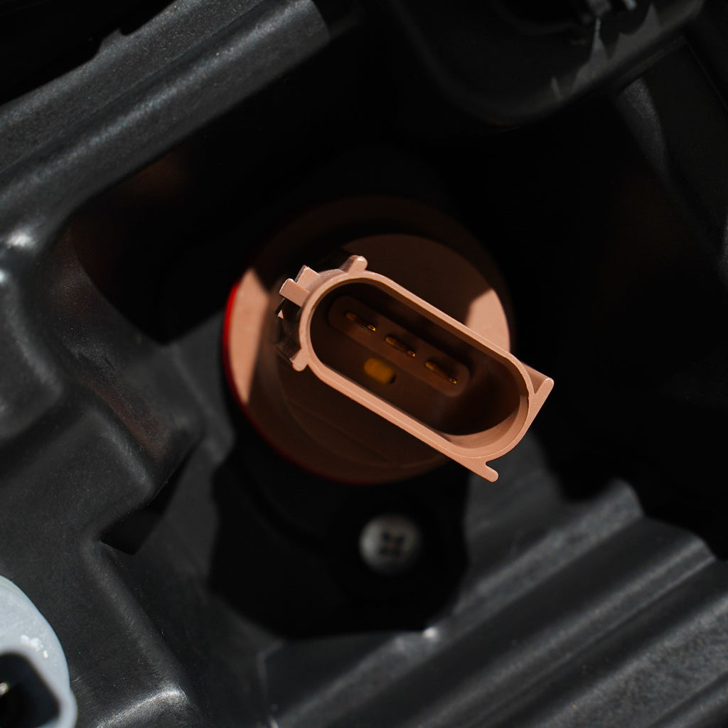 Halogen headlight adjuster close-up for 2023-2026 Ford Super Duty